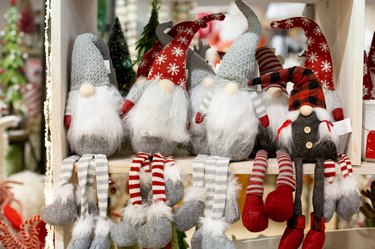 A row of gnomes in a gift shop