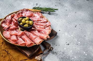 Cured meat platter of traditional Italian appetizers with prosciutto crudo, salami and coppa sausage