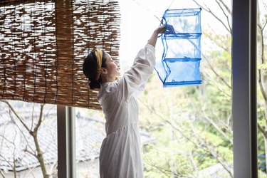 A woman making dry food at home.