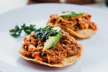 mexican tostada with Bacalao a la Vizcaina mexican food in mexico city