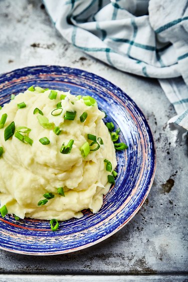 Mashed potatoes topped with chopped green onions