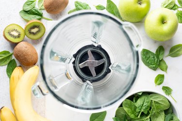 Electric blender cup and ingredients for smoothie