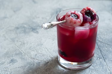 Halloween cocktail with lychee and blueberry eye