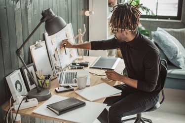 Young man working at home