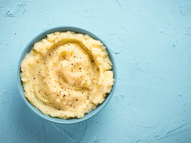 Mashed potatoes on blue background