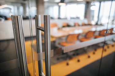 Close up of glass door of a board room.