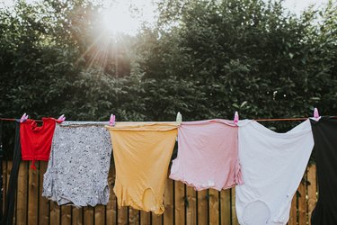 Damp clothing hanging on a washing line