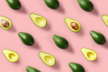 Avocado colorful pattern on a pink background