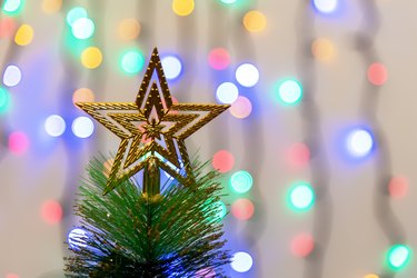 Christmas Tree Star With Christmas Light Background