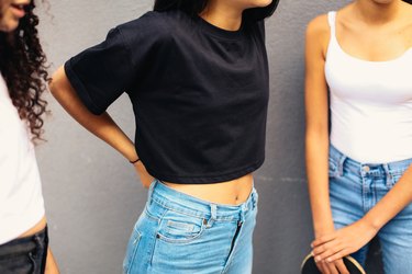 Girl wearing jeans and crop top
