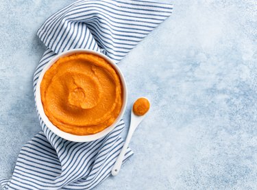 Pumpkin puree in white ceramic bowl