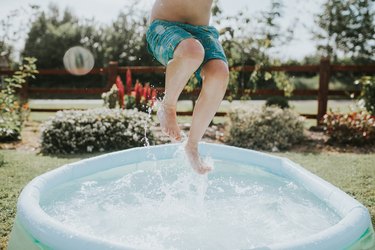 Boy in inflatable pool