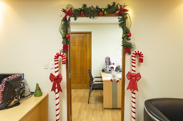 Door frame with Christmas decoration in the office