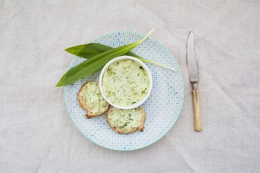 Compound butter on plate with bread