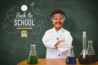 Composite image of cute pupil dressed up as scientist