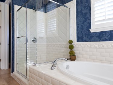 Bathroom with blue wallpaper