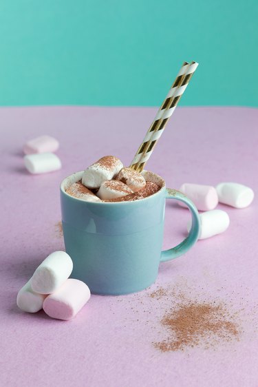 Hot drink with marshmallows and cacao sprinkles on top
