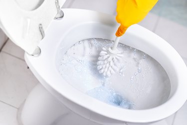 How do I clean off Black toilet bowl crust?