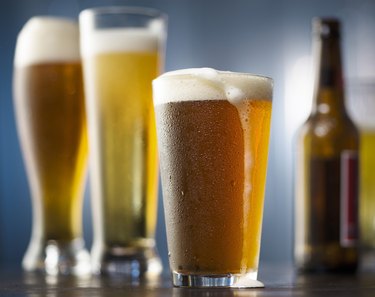 Beer glasses and bottles in enironment