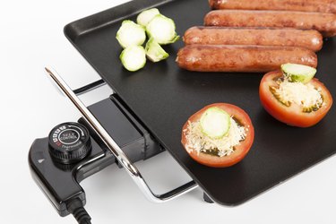 Electric griddle for cooking; photo on white background.