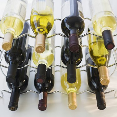 Assorted wine bottles on wine rack