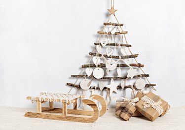 Zero waste christmas with gifts wrapped in craft paper and alternative handmade xmas tree