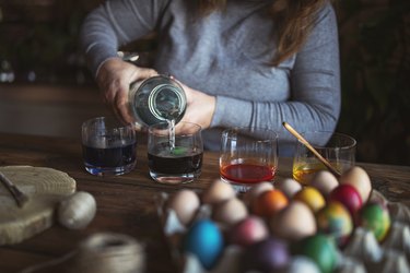 Woman Paintings Easter Eggs At Home