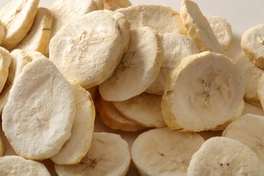 Pile of sweet dehydrated banana slices.