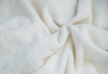 Close-up white texture of crumpled towels for background. the cloth