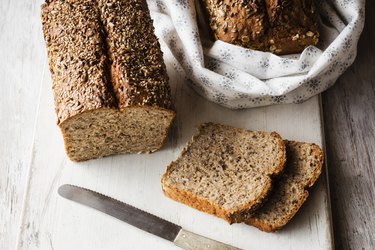 Home baked buckwheat bread and slices kept on cutting board