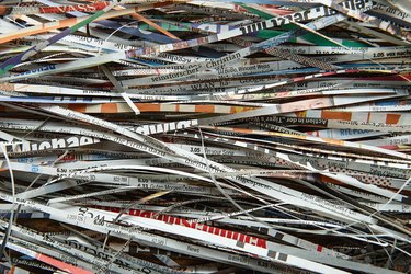 Close up stack of scrap paper from paper cutter for background. Paper recycling to the destroyer. The concept of recycling of raw materials and environmental protection