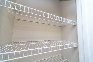 Empty wire shelving storage in an empty closet