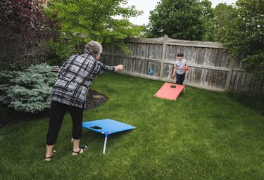 Family playing lawn games