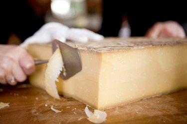 Slicing a block of cheese