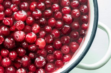 Raw cranberries in colander