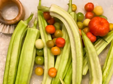 Fresh homegrown okra and heirloom tomatoes from the vegetable garden