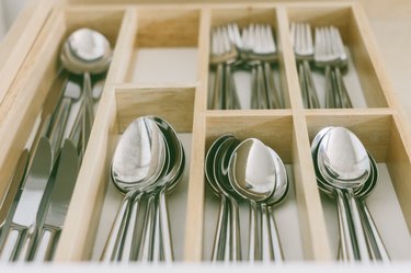 Closeup of open cutlery drawer