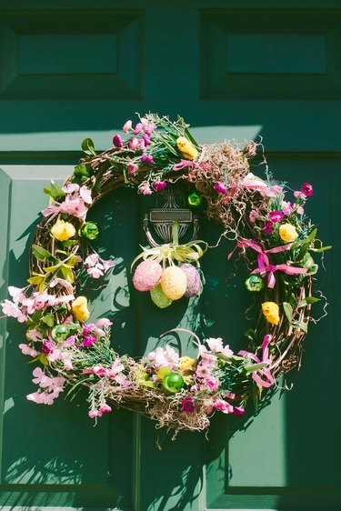 Close-Up View of Green Front Door with Easter Wreath