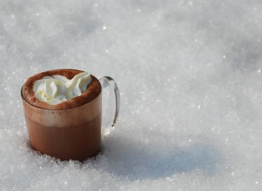 Hot chocolate on snow-covered field