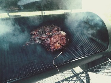 High Angle View Of Beef Ribs Cooking In Barbecue Grill