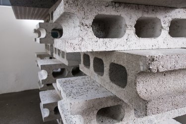 stack of gray concrete construction blocks isolated.