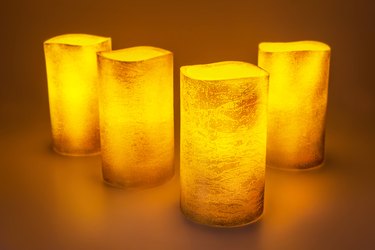 Four golden LED wax candles
