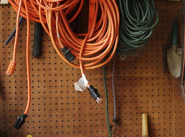 Extension cords on garage wall