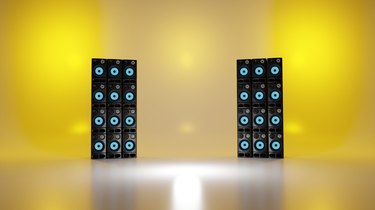 Tower of loudspeakers on stage. Music concert, recording studio concept. Digital 3D render.