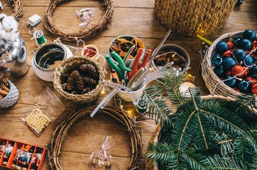 Crafting station using pinecones and Christmas tree branches