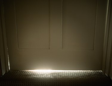 Light glowing from under door