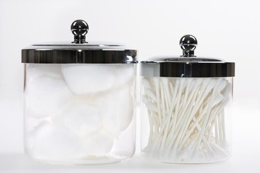 Jars with cotton balls and swabs