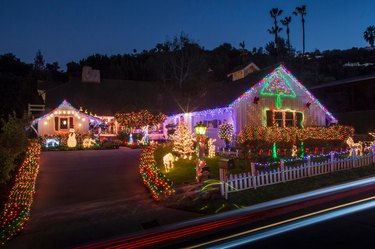 House with abundant exterior Christmas lights