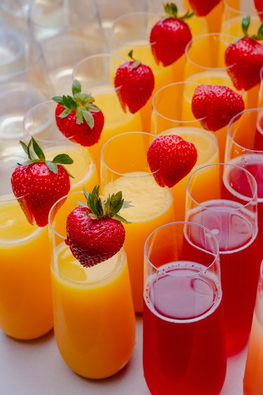 Mimosa bar with strawberry garnish