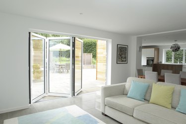 Open plan living area with open patio doors